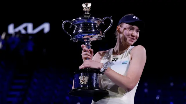 Elena Rybakina holds the Australian Open winner's trophy