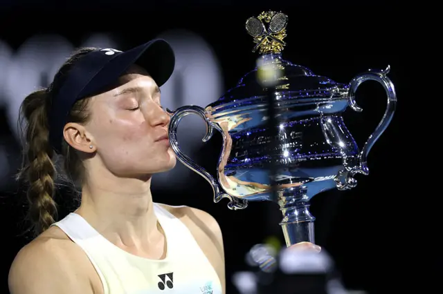 Elena Rybakina of Kazakhstan kisses the Daphne Akhurst Memorial Cup