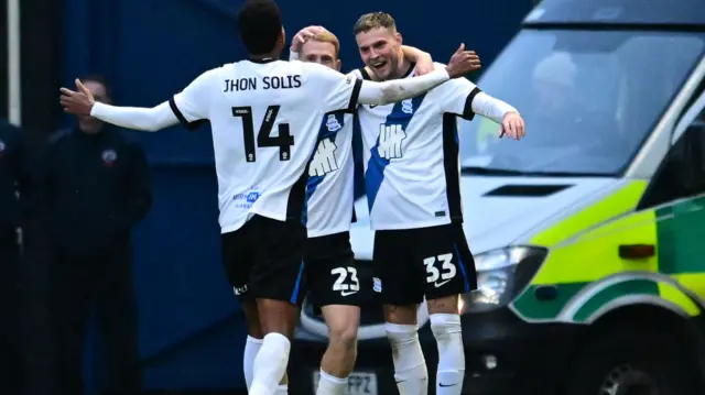 Birmingham players celebrate at Oxford