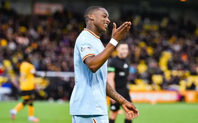 Tawanda Maswanhise celebrates