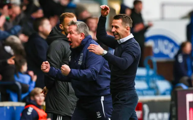 Dundee's Billy Dodds and Neil McCann celebrate