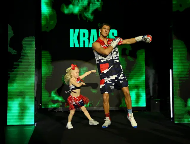 Gradus Kraus dances with his daughter