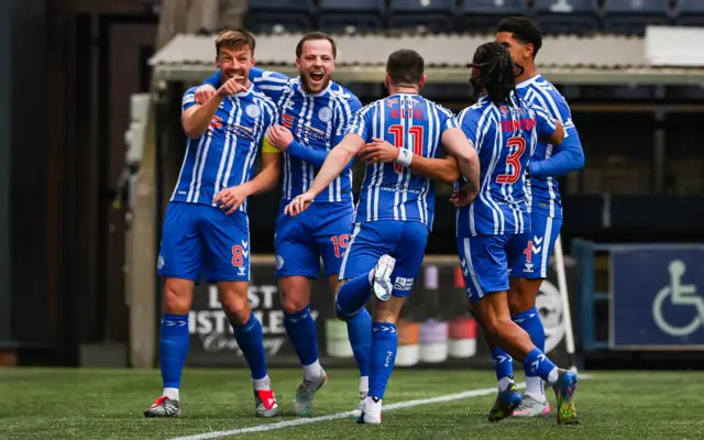 Kilmarnock's Brad Lyons (L) celebrates scoring to make it 1-0 with teammates (L-R) Bruce Anderson, Greg Kiltie, Dominic Thompson and Tyreece John-Jules during a William Hill Premiership match between Kilmarnock and Aberdeen at the BBSP Stadium Rugby Park