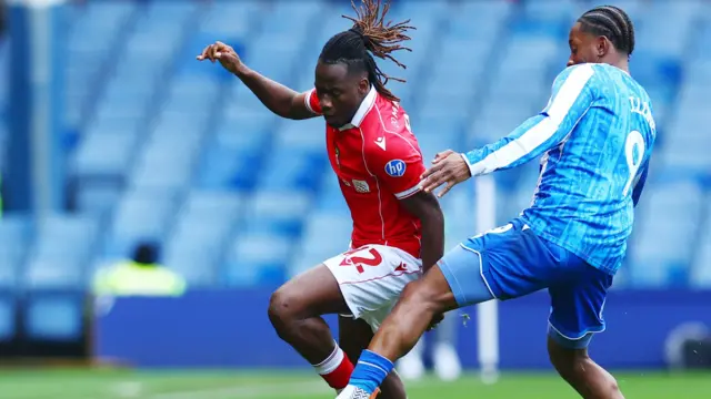 Issa Kabore in action for Wrexham against Sheffield Wednesday
