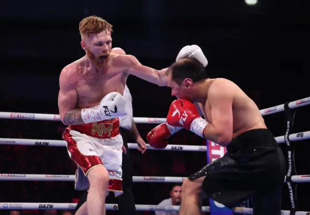 Kieran Macdonald punches Marius Vysniauskas
