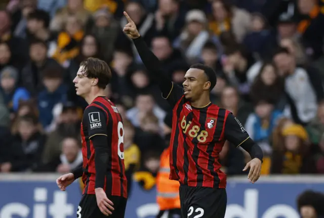 Kroupi celebrates his opening goal v Wolves