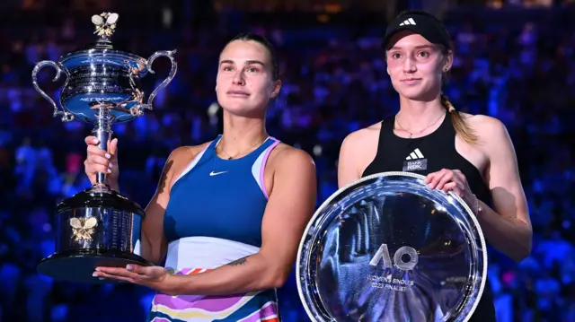 Aryna Sabalenka and Elena Rybakina hold trophies after the 2023 Australian Open