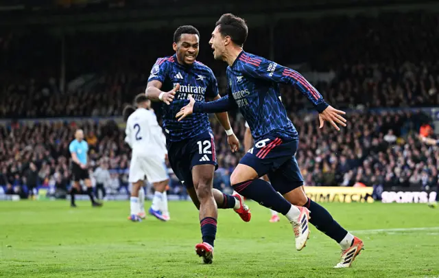 Martín Zubimendi celebrates with teammates after scoring the opener