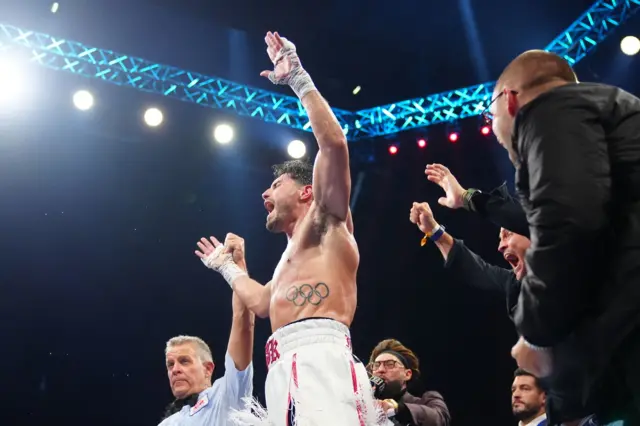 Josh Kelly is announced the winner and celebrates