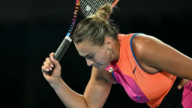 Aryna Sabalenka reacts after missing a shot