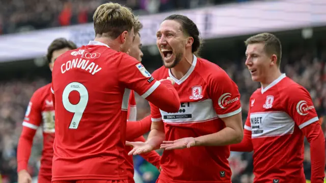 Middlesbrough players celebrate a goal in their 4-0 win over Preston
