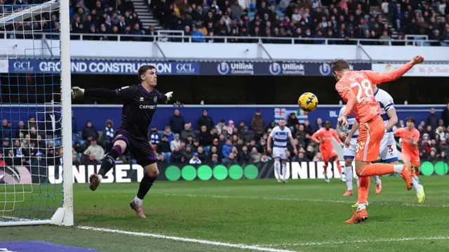 Josh Eccles heads in at the far post