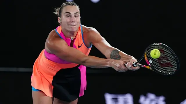 Aryna Sabalenka plays a backhand