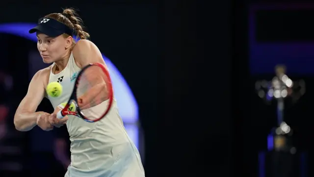 Elena Rybakina of Kazakhstan plays a backhand