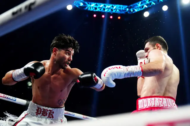 Josh Kelly in action in the ring with Murtazaliev