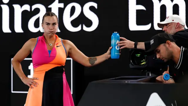 Aryna Sabalenka talks to coach Jason Stacy