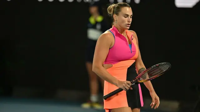 Belarus' Aryna Sabalenka looks at her racquet