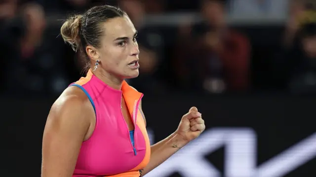 Aryna Sabalenka celebrates winning the second set
