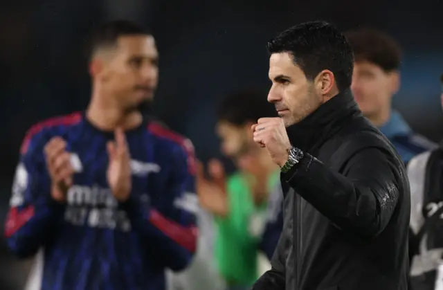 Arteta pumps his fist at the away end