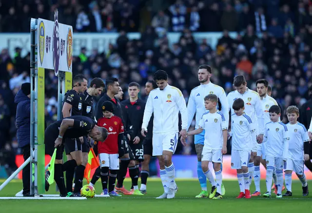 : Pascal Struijk of Leeds United leads the team out prior to the Premier League match between Leeds United and Manchester United at Elland Road on January 04, 2026 in Leeds, England.
