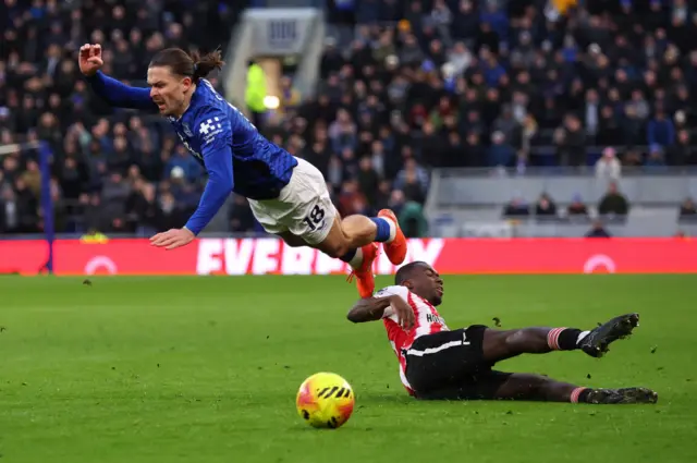 Everton's Jack Grealish in action with Brentford's Michael Kayode
