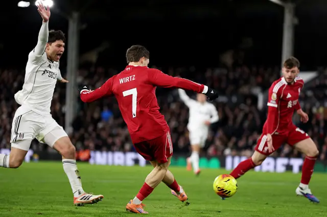 Florian Wirtz of Liverpool scores