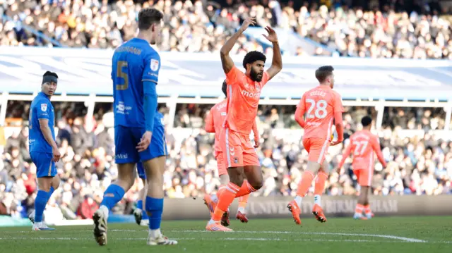 Ellis Simms celebrates scoring