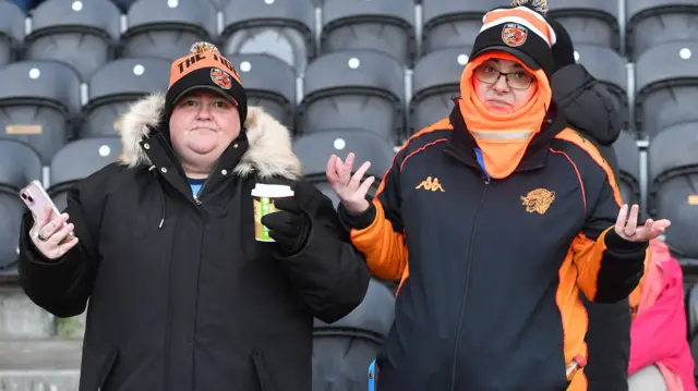 Hull fans look disappointed after game postponed