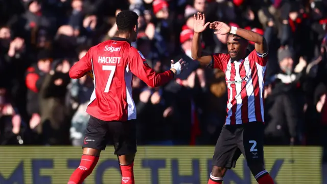 Lincoln celebrate a goal
