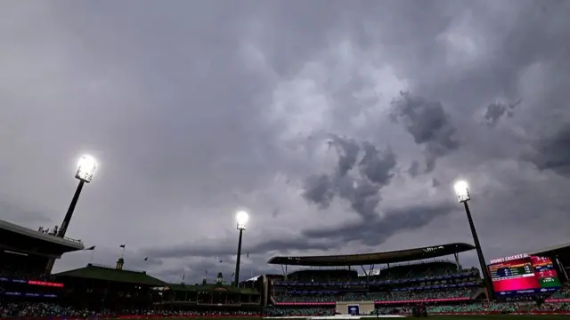 Covers are seen over the pitch as rain falls on day one of the fifth Ashes cricket