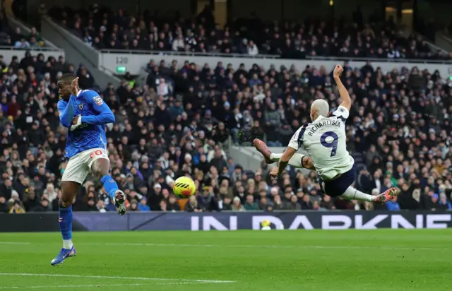 Sunderland's Nordi Mukiele in action as Tottenham Hotspur's Richarlison shoots at goal