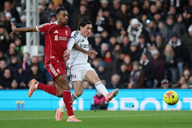 Harry Wilson (R) scores the opening goal