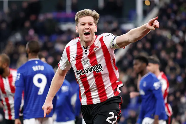 Nathan Collins of Brentford celebrates scoring his team's second goal during the Premier League match between Everton and Brentford at Hill Dickinson Stadium on January 04, 2026 in Liverpool, England.