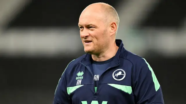 A smiling Millwall boss Alex Neil