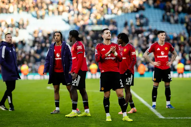 Diogo Dalot of Manchester United applauds fans following the Premier League match between Leeds United and Manchester United at Elland Road on January 04, 2026 in Leeds, England