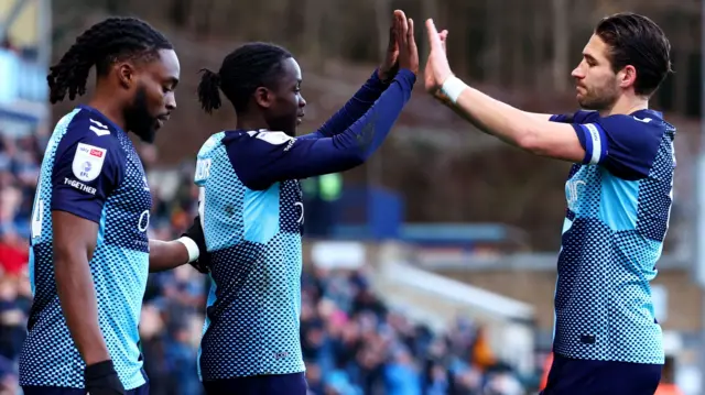 Wycombe players celebrate