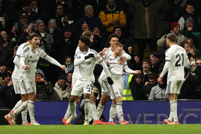 Fulham's Harrison Reed celebrates scoring their second goal with teammates