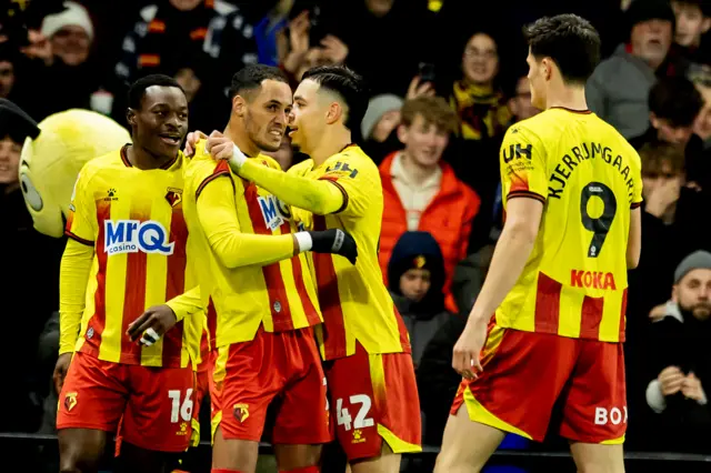 Watford players celebrate a goal with hat-trick hero Tom Ince in the 3-0 win over Birmingham on 1 January