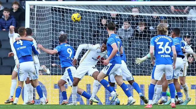 Will Grigg scores for Chesterfield
