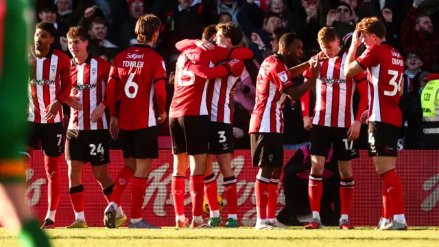 Lincoln players celebrate