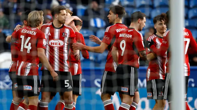 Exeter players celebrate