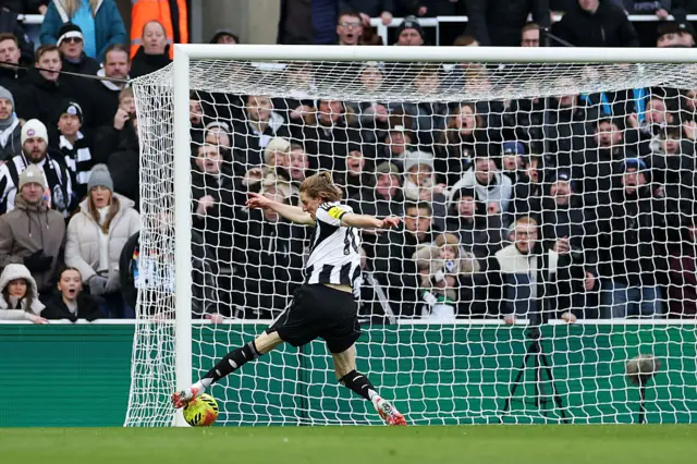 Anthony Gordon of Newcastle United scores