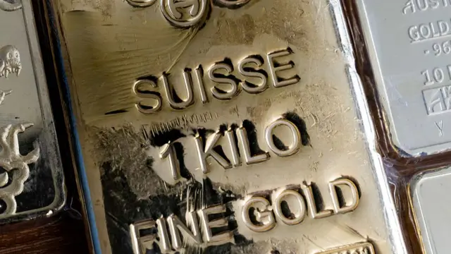 A close up image of a 1kg bar of gold