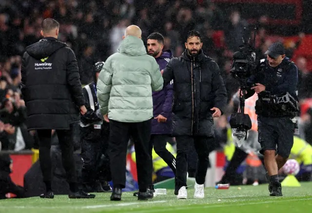 Ruben Amorim, Manager of Manchester United, shakes hands with Enzo Maresca, Manager of Chelsea, after the Premier League match between Manchester United and Chelsea at Old Trafford on September 20, 2025 in Manchester, England.