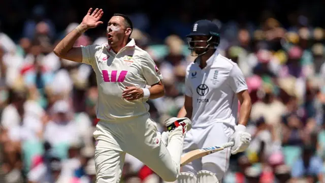 Scott Boland of Australia reacts