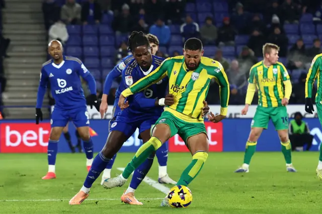 West Bromwich Albion forward Karlan Grant (10) holds off Leicester City defender Caleb Okoli (5)