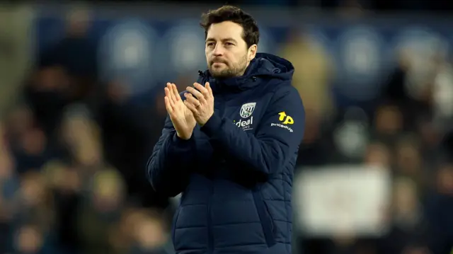 Albion boss Ryan Mason looks dejected as he applauds the travelling fans after the 1-0 defeat at Swansea