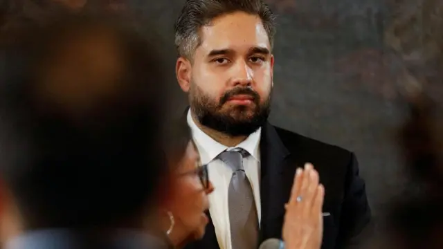 Vice President Delcy Rodriguez is sworn in as Venezuela’s interim president while Nicolas Maduro Guerra, son of ousted president Nicolas Maduro looks on, at the National Assembly