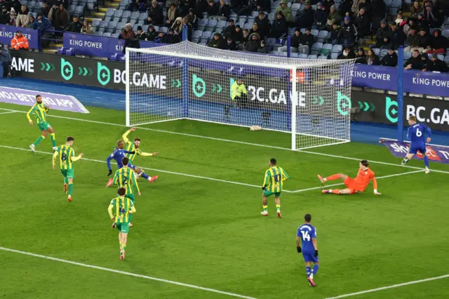 Jordan Ayew of Leicester City scores a goal and celebrates