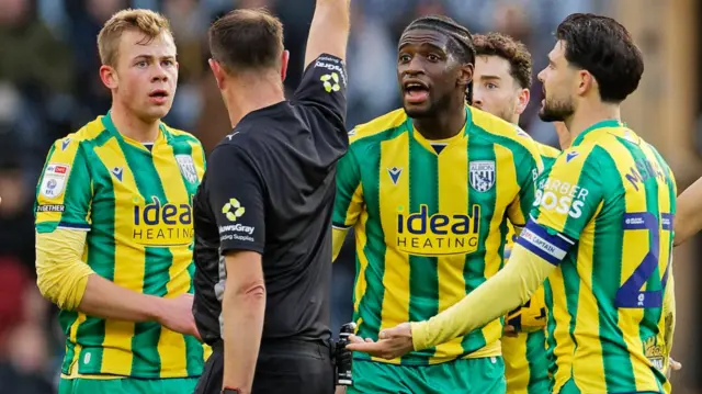 West Bromwich Albion players look on with frustration during the 1-0 defeat at Swansea